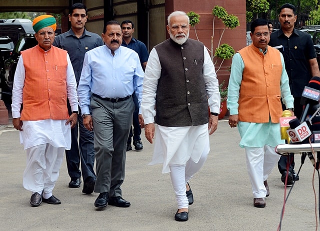 Prime Minister Narendra Modi and Union Minister Dr. Jitendra Singh arrives to attend the 17th Parliament Session in New Delhi on Monday.