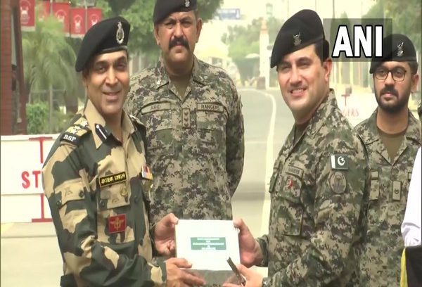 Border Security Force (BSF) exchanged sweets with Pakistan Rangers at the Attari-Wagah International Border in Punjab's Amritsar on the occasion of India's 74th Republic Day