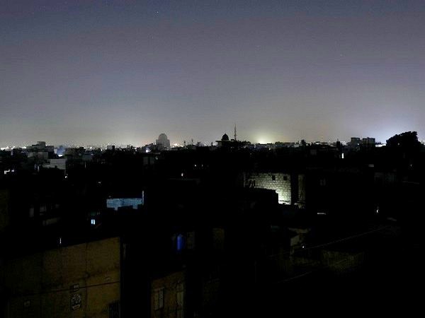 A general view of a residential area is seen during a power breakdown in Karachi, Pakistan, January 10, 2021. REUTERS/Akhtar Soomro - RC2K4L9PI1C2